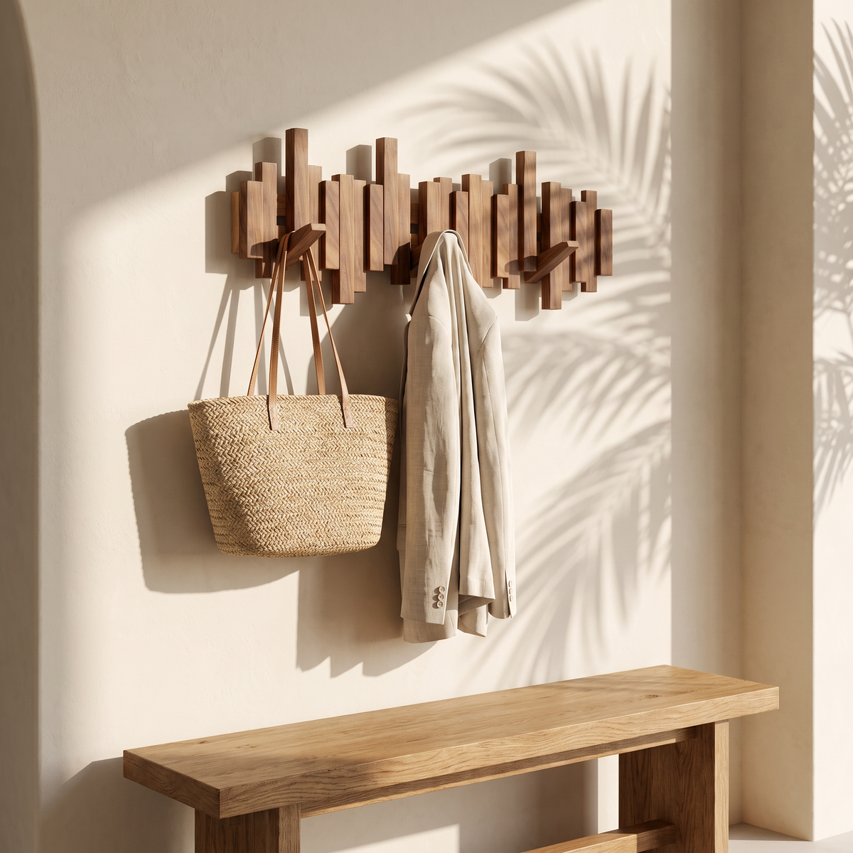 Coat rack in a warm modern entryway with a jacket and tote
