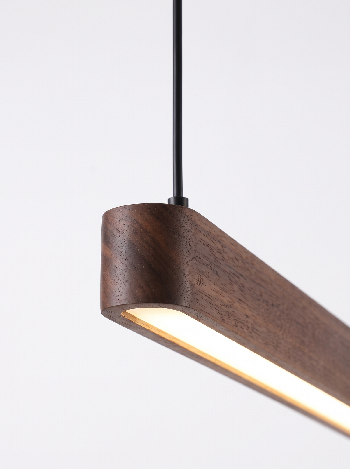 Close view of the pendant light cord and LED strip