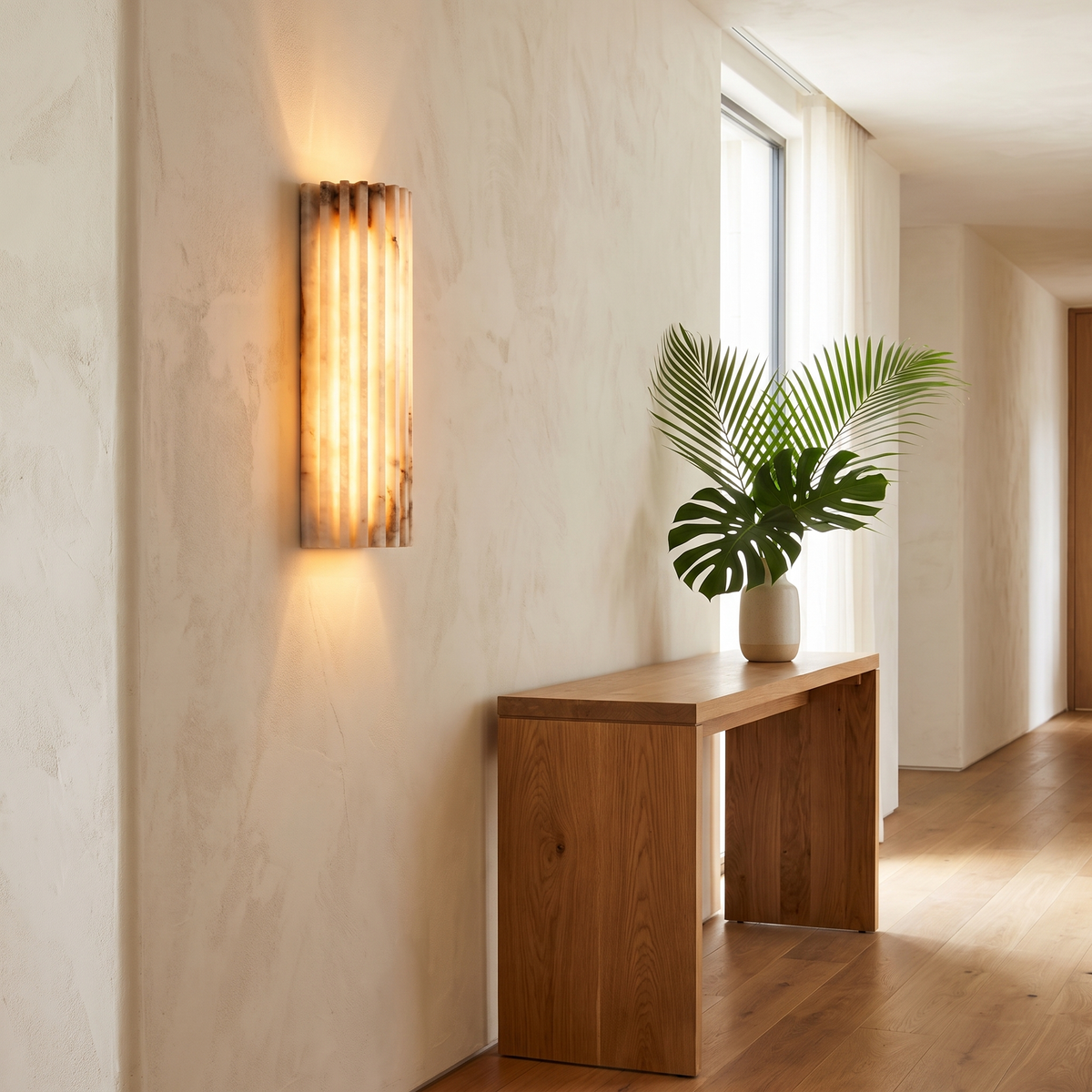 Marlowe sconce lighting a hallway wall