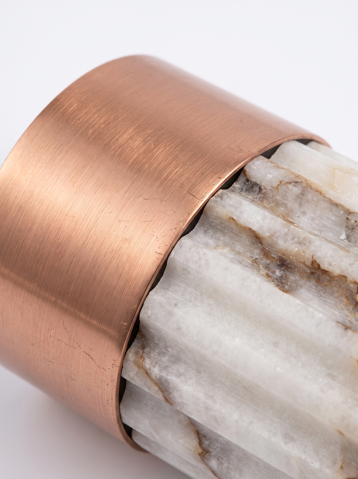 Copper cap and marble seam close up